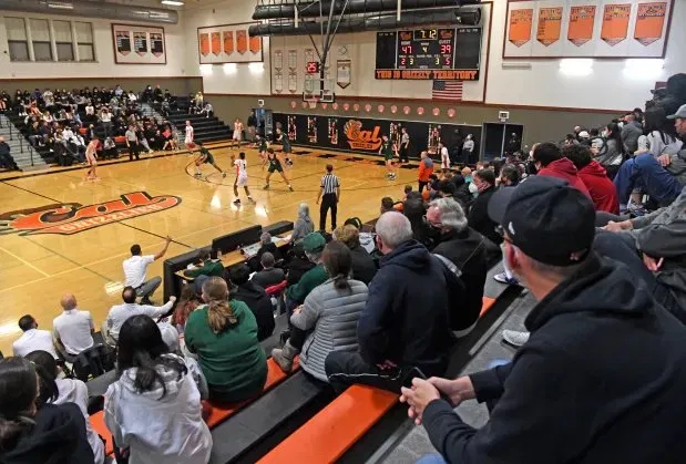 Packed Cal High gym during a varsity basketball game